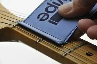 The Swipe String Cleaner